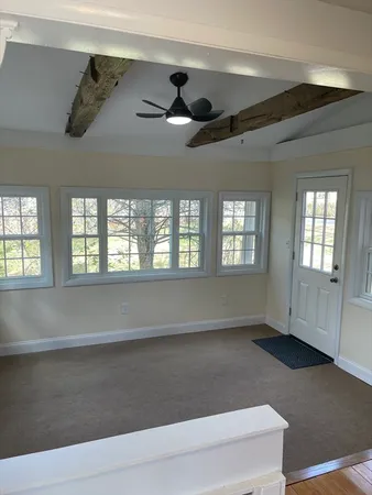 an empty room with windows