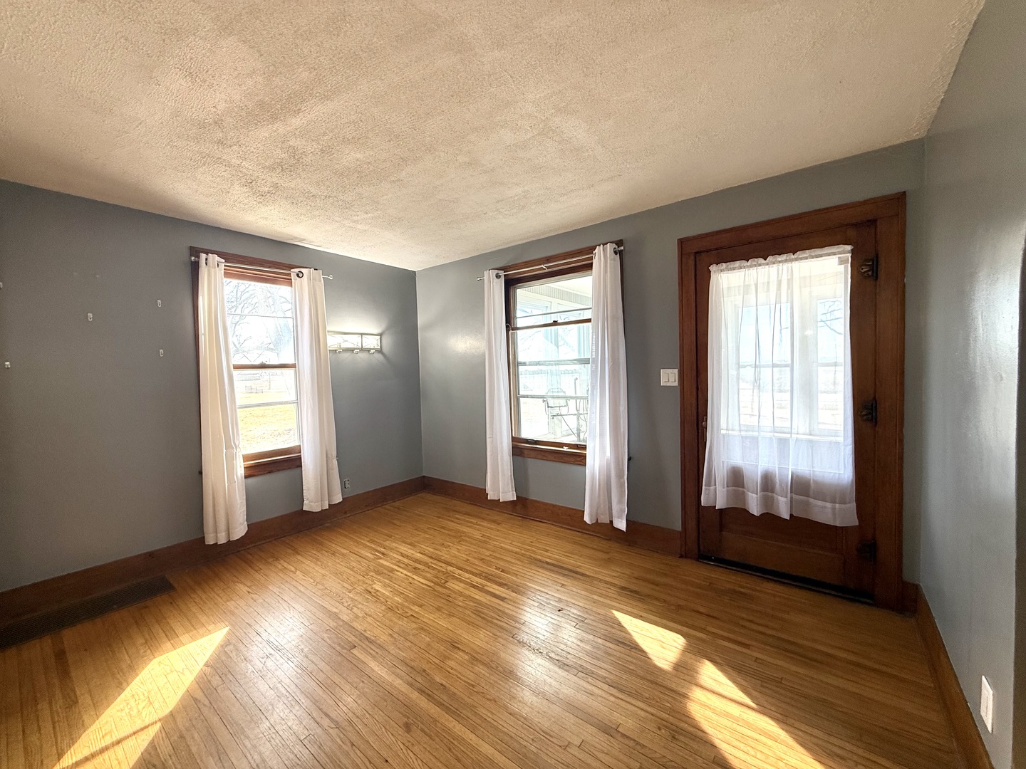 4799 South Center Road Rochelle, IL 61068 - Photo 12 of 30 a view of empty room with wooden floor and fan