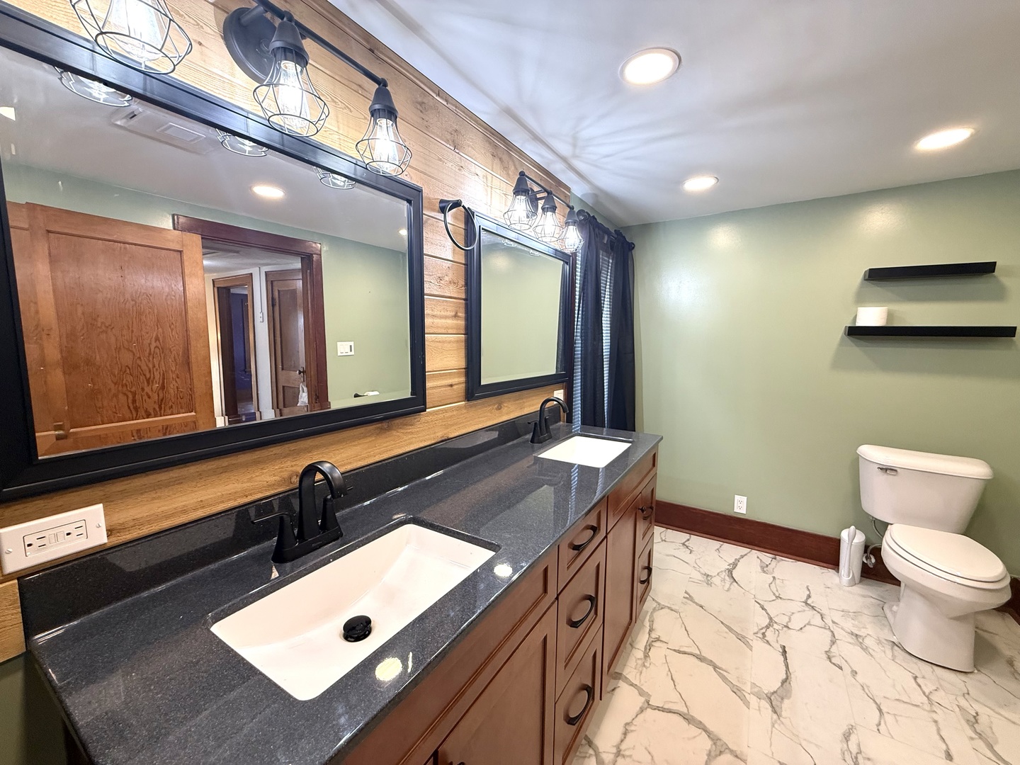 4799 South Center Road Rochelle, IL 61068 - Photo 19 of 30 a bathroom with a sink a toilet and mirror