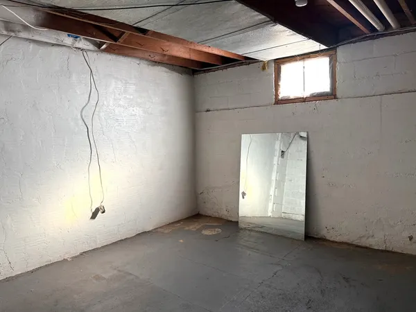 a view of a room with a walk in closet