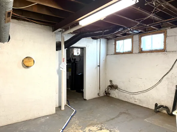 a view of a room with rack on the wall