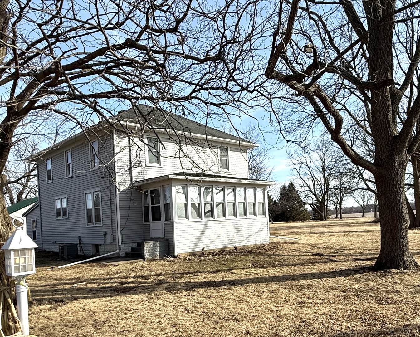 4799 South Center Road Rochelle, IL 61068 - Photo 3 of 30 a view of a house with snow on the ground
