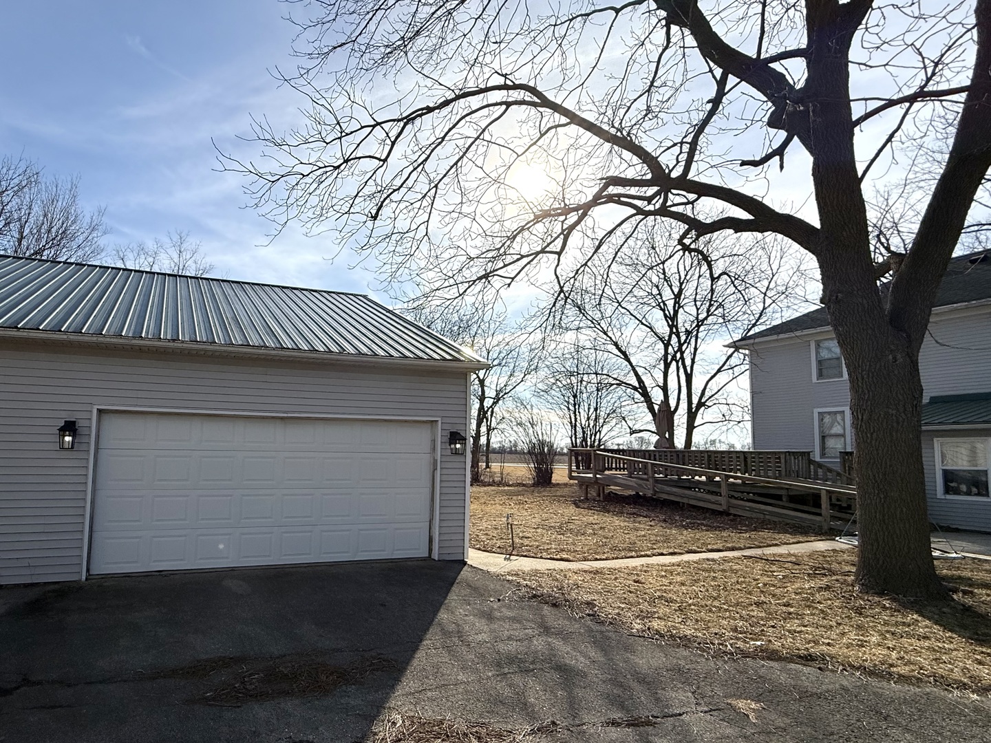 4799 South Center Road Rochelle, IL 61068 - Photo 7 of 30 a house with trees in front of it