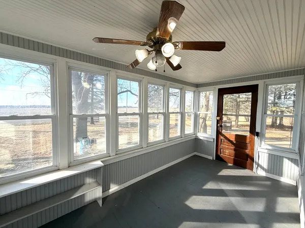a large living room with a large window