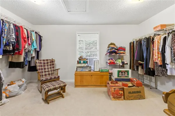 a view of a workspace with furniture