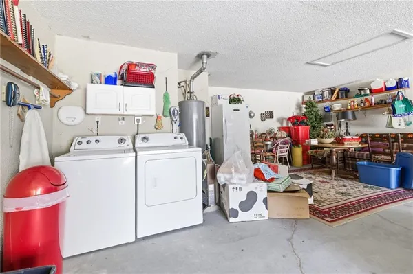 a view of a balcony with furniture