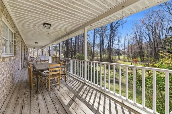 a view of a playground with basketball court