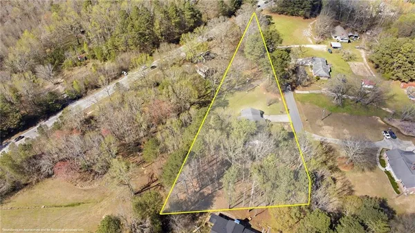 an aerial view of a city with lots of residential buildings