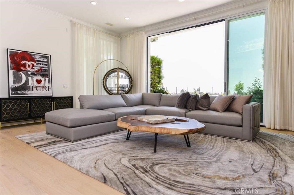 7 Via Brezza Newport Coast, CA 92657 - Photo 29 of 74 a living room with furniture and a large window