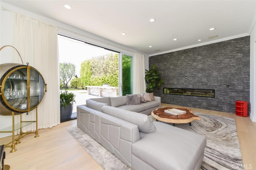 7 Via Brezza Newport Coast, CA 92657 - Photo 32 of 74 a living room with furniture and a fireplace