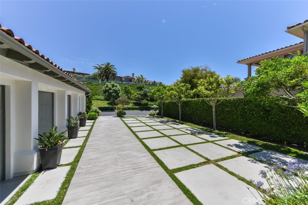 7 Via Brezza Newport Coast, CA 92657 - Photo 52 of 74 a backyard of a house with lots of green space