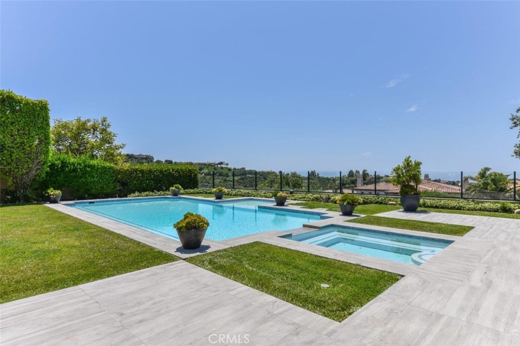 7 Via Brezza Newport Coast, CA 92657 - Photo 74 of 74 a view of swimming pool with seating area and trees around