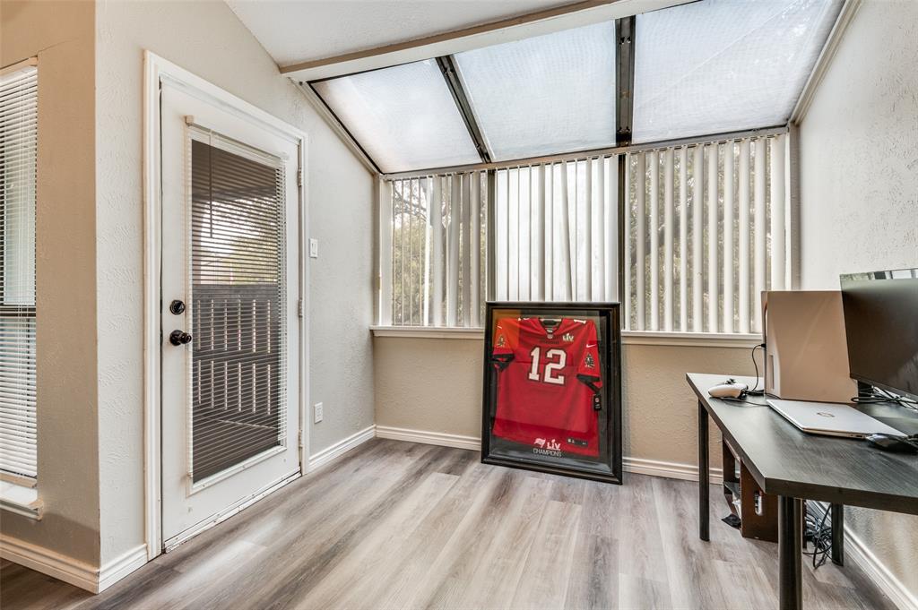 2110 Randy Snow Road, Unit 313 Arlington, TX 76011 - Photo 5 of 25 a view of an empty room with window wooden floor