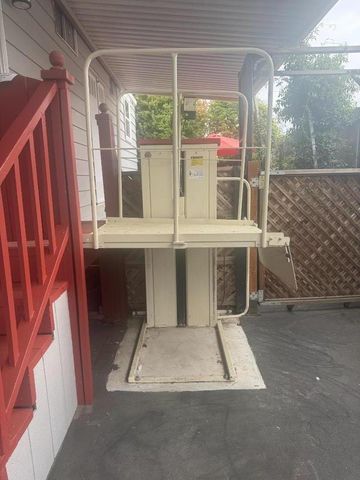 a view of livingroom with furniture and window