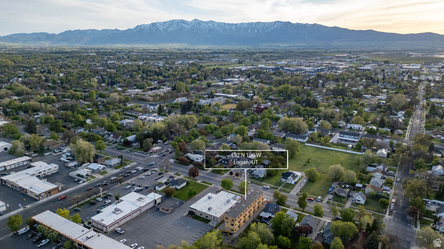 452 North 100 West, Unit 102 Logan, UT 84321 - Photo 26 of 34 Aerial view of property's location with property boundaries highlighted and mountains