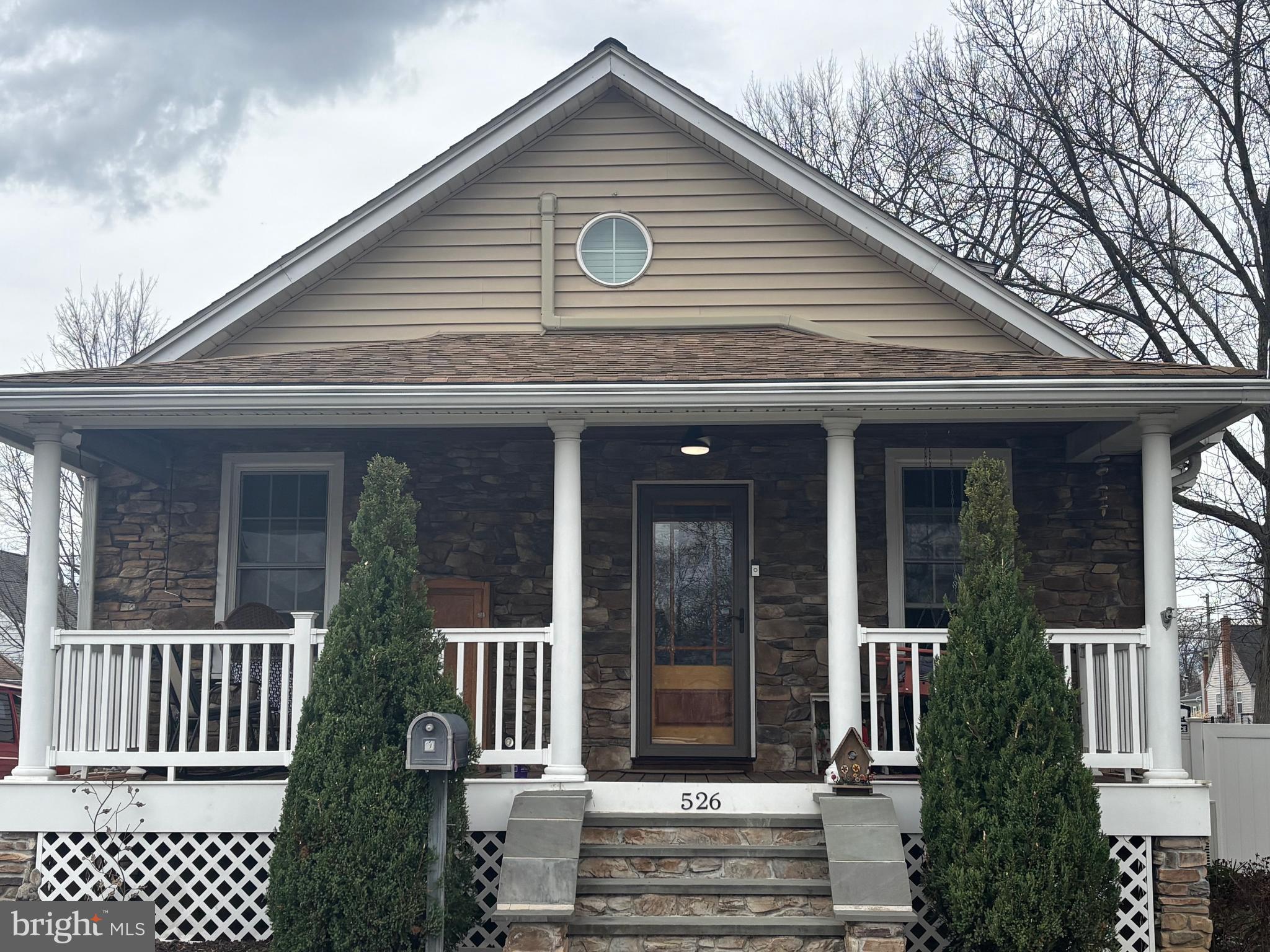 526 Hawthorne Road Linthicum Heights, MD 21090 - Photo 1 of 4 a front view of a house with a porch