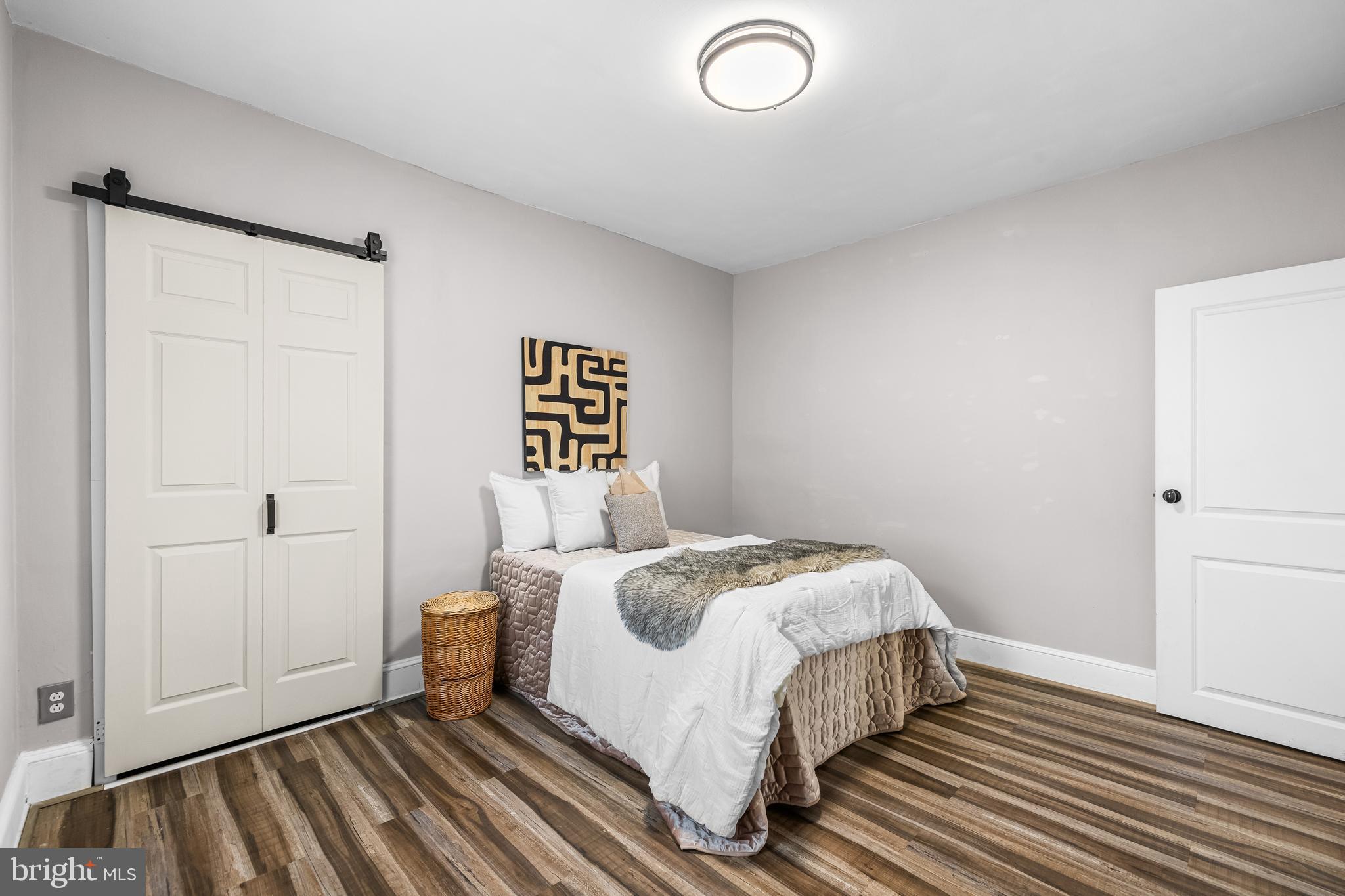 526 Hawthorne Road Linthicum Heights, MD 21090 - Photo 27 of 50 a bedroom with a bed and a window