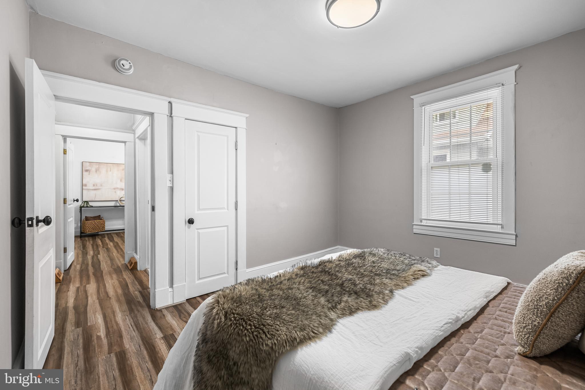 526 Hawthorne Road Linthicum Heights, MD 21090 - Photo 28 of 50 a bedroom with a bed and a large window