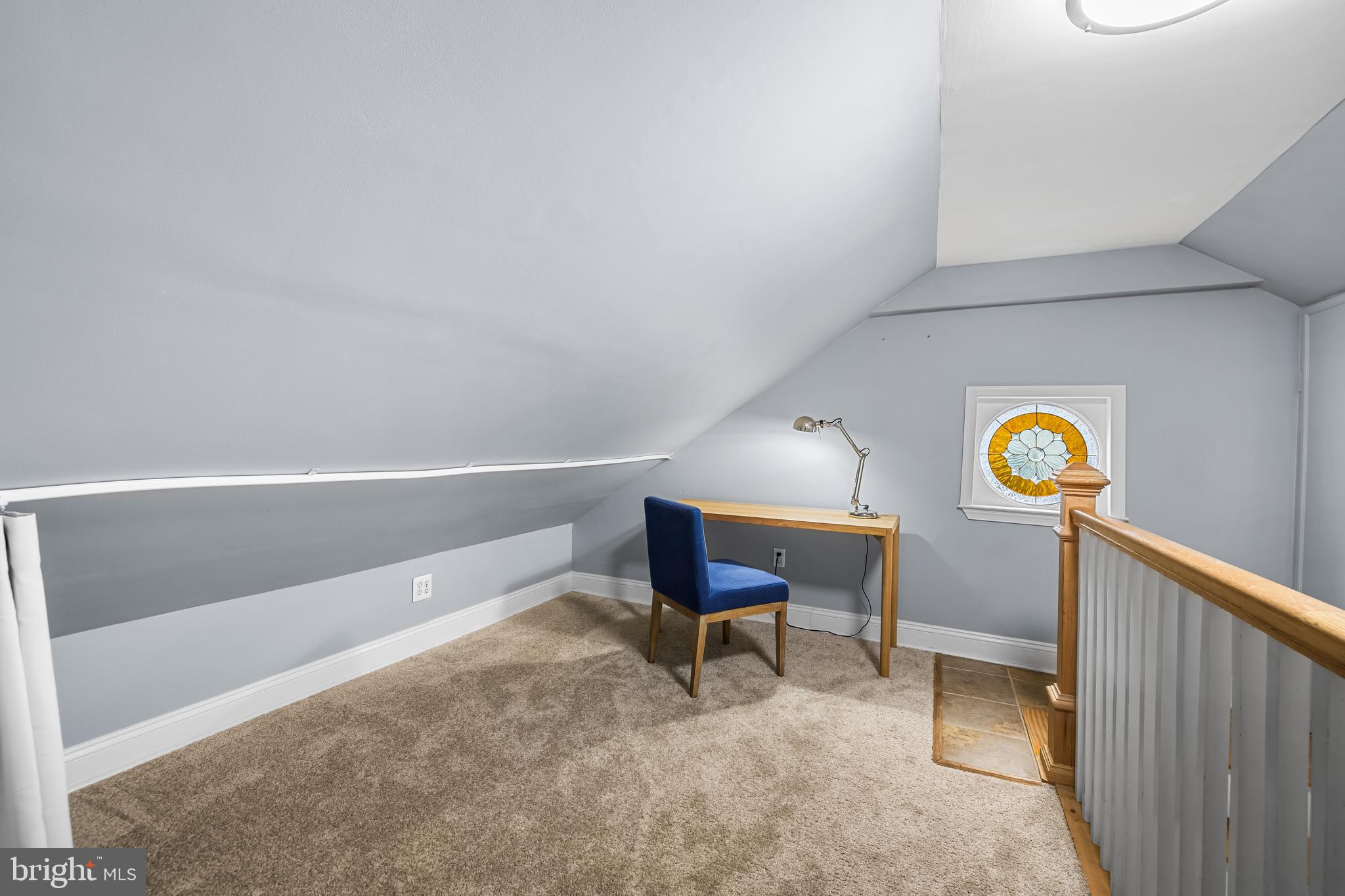 526 Hawthorne Road Linthicum Heights, MD 21090 - Photo 38 of 50 a view of a room with wooden floor and bench