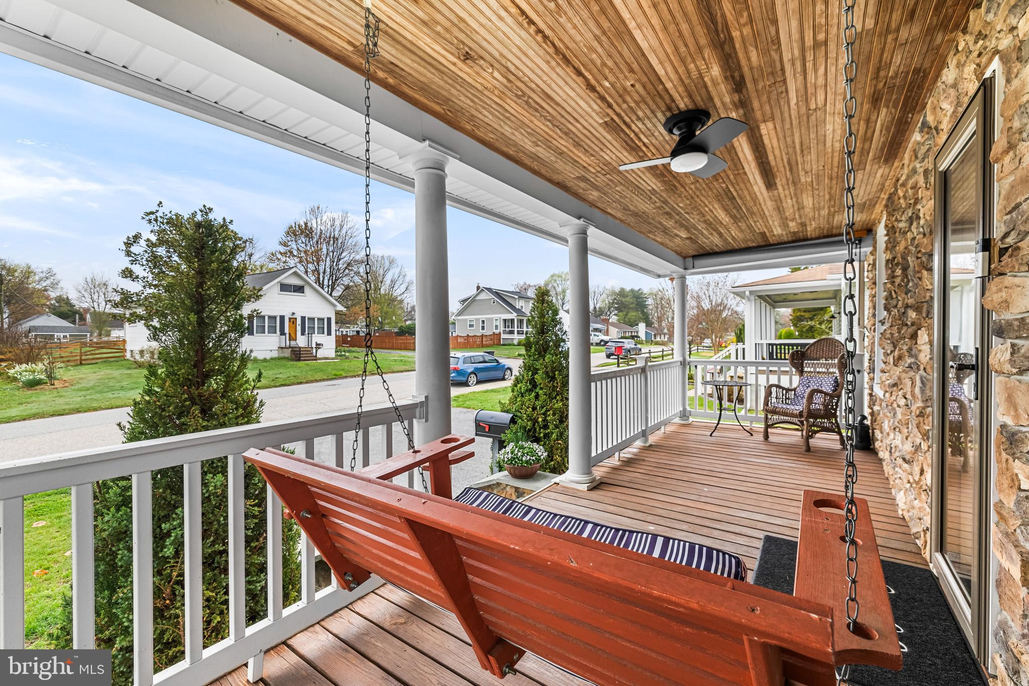 526 Hawthorne Road Linthicum Heights, MD 21090 - Photo 4 of 50 a view of a patio with a table chairs and balcony
