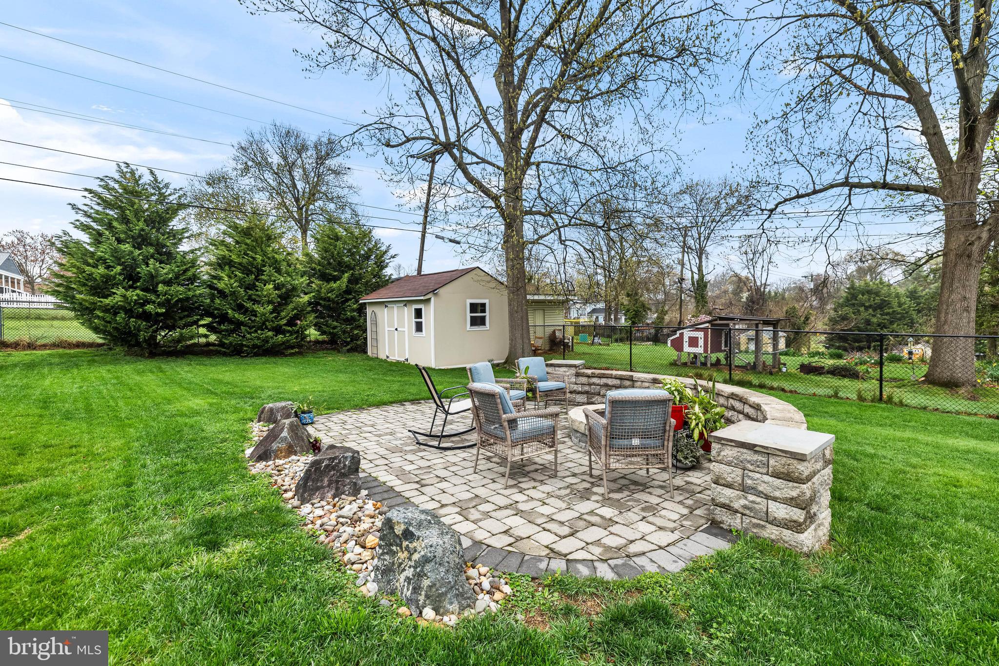 526 Hawthorne Road Linthicum Heights, MD 21090 - Photo 46 of 50 a view of a house with backyard sitting area and garden