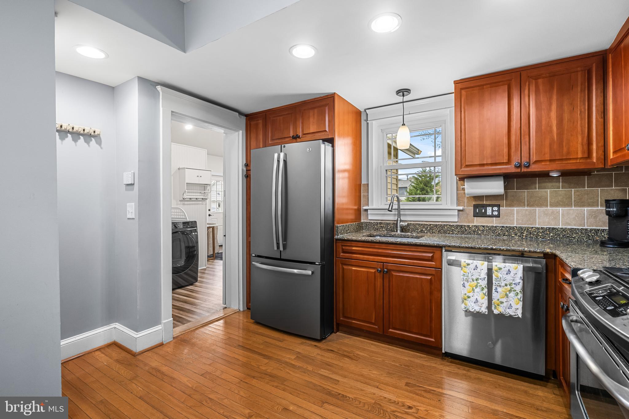 526 Hawthorne Road Linthicum Heights, MD 21090 - Photo 10 of 50 a kitchen with stainless steel appliances granite countertop a refrigerator stove and sink