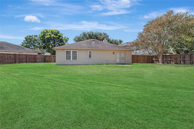 a house view with a garden space
