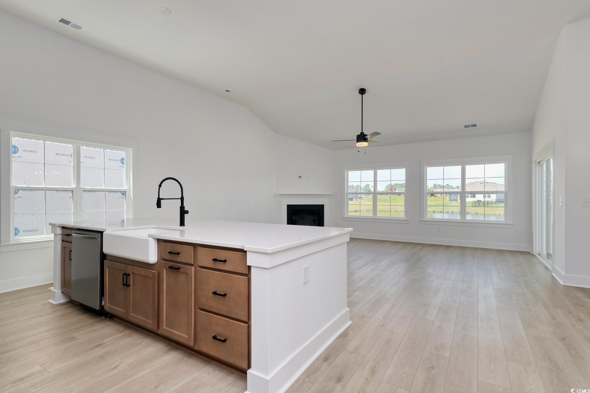 4028 Bucolic Loop Myrtle Beach, SC 29588 - Photo 14 of 40 Kitchen with a sink, a ceiling fan, stainless stee