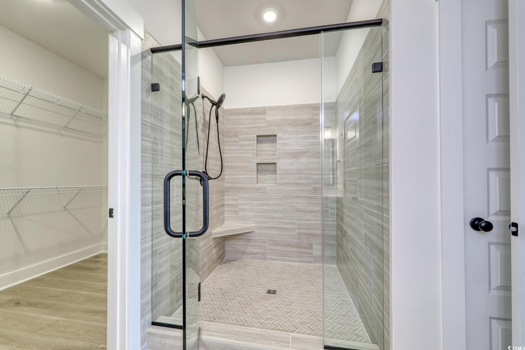 4028 Bucolic Loop Myrtle Beach, SC 29588 - Photo 26 of 40 Full bath featuring a stall shower, wood finished