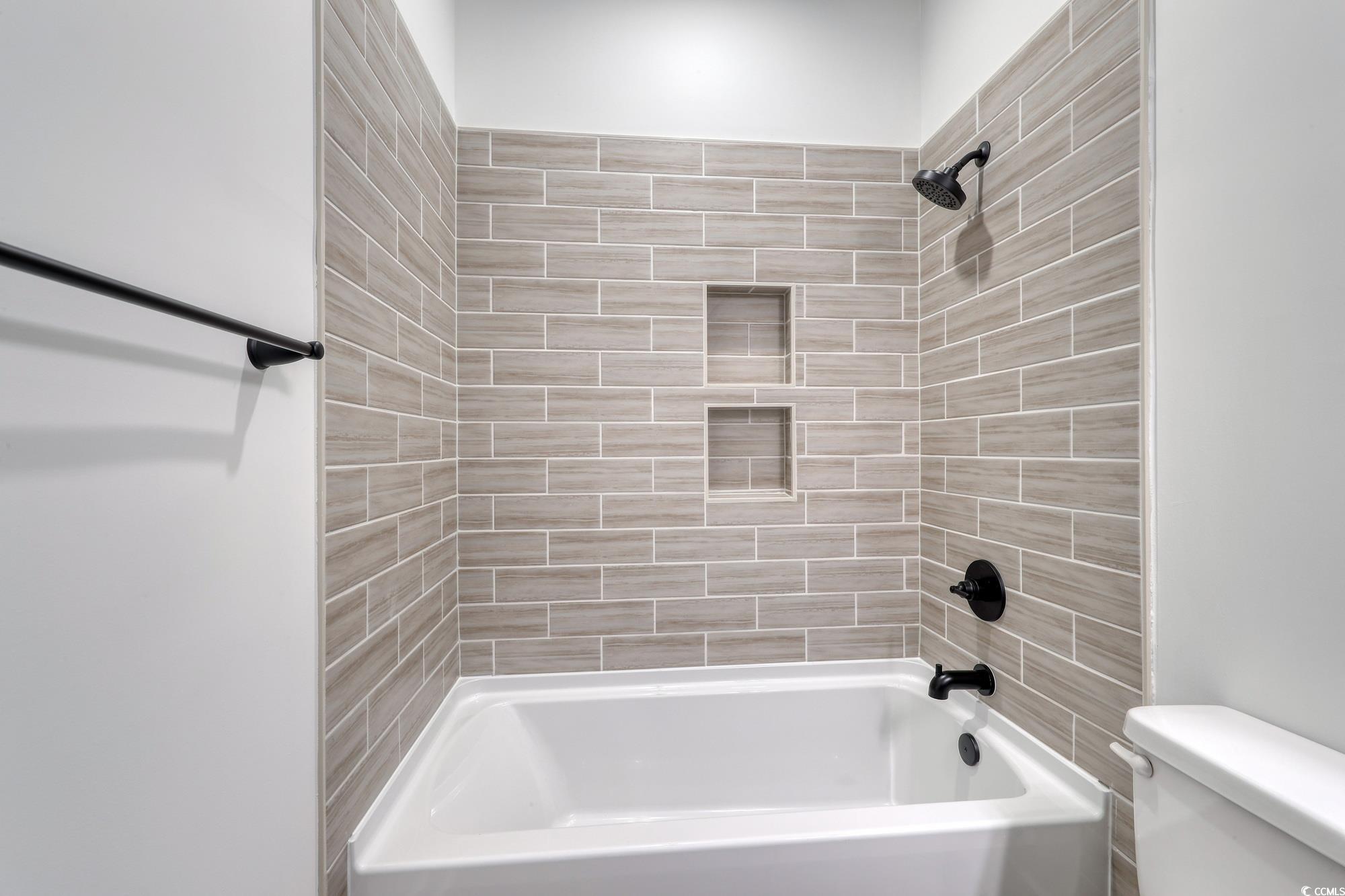4028 Bucolic Loop Myrtle Beach, SC 29588 - Photo 10 of 40 Full bathroom with toilet and shower combination