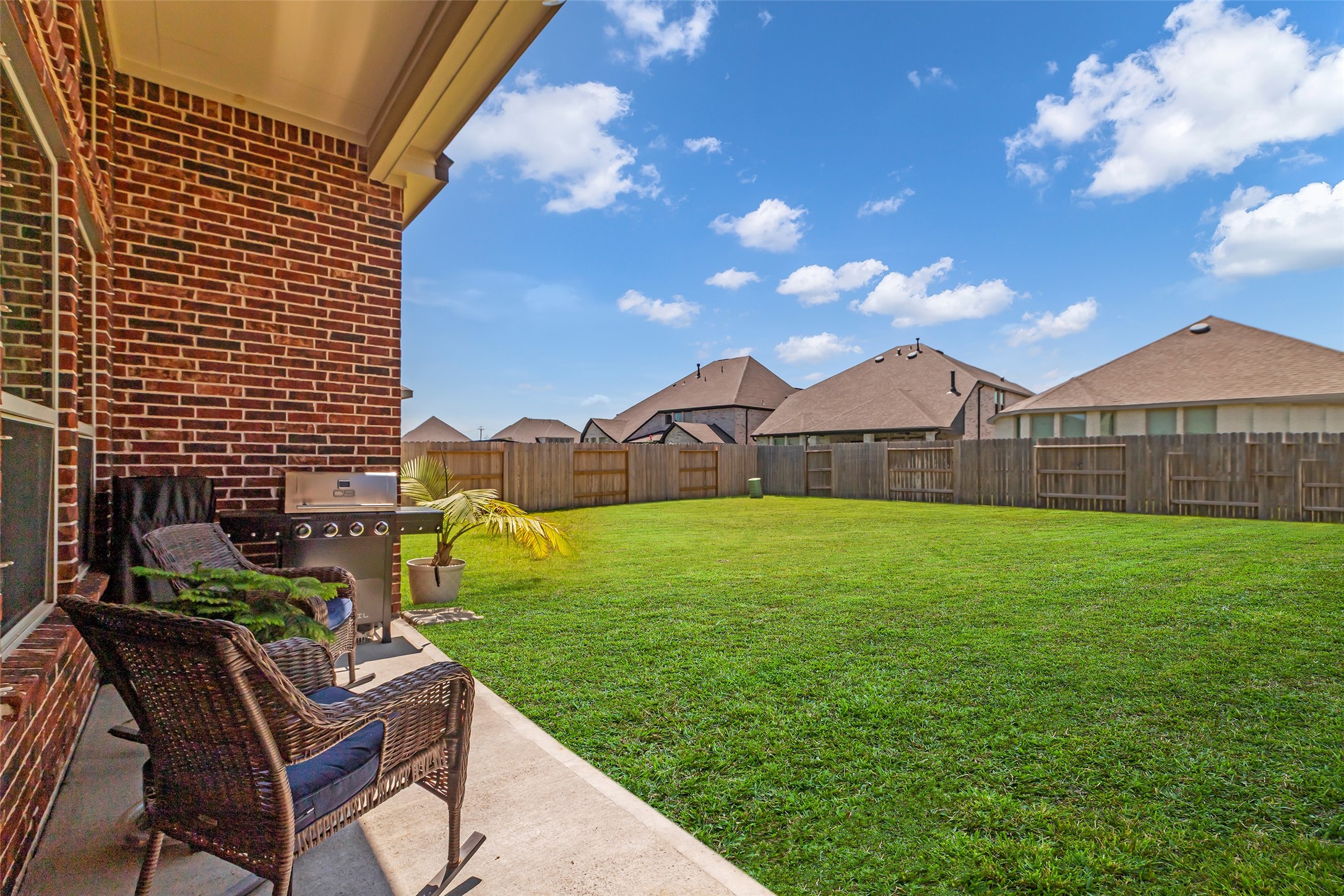 423 Round Top Street Webster, TX 77598 - Photo 39 of 49 Relax and cookout under your cool covered patio.