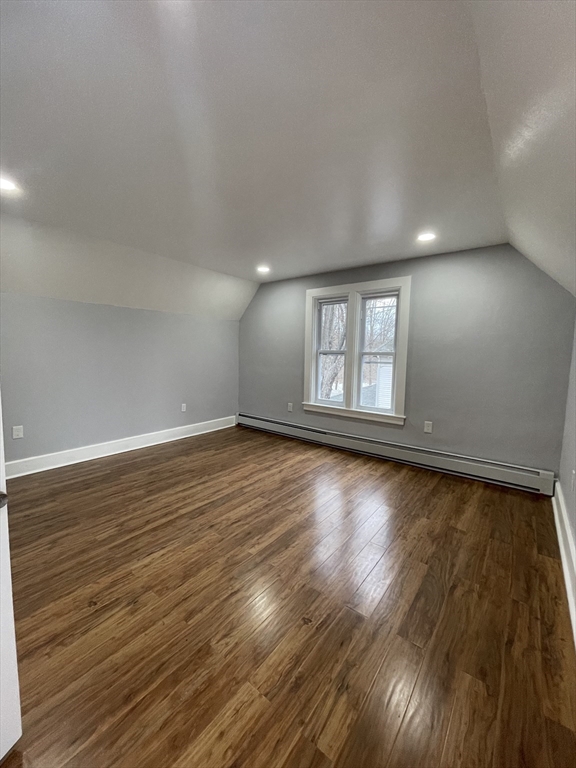59 High Street Warren, MA 01083 - Photo 24 of 42 an empty room with wooden floor and windows