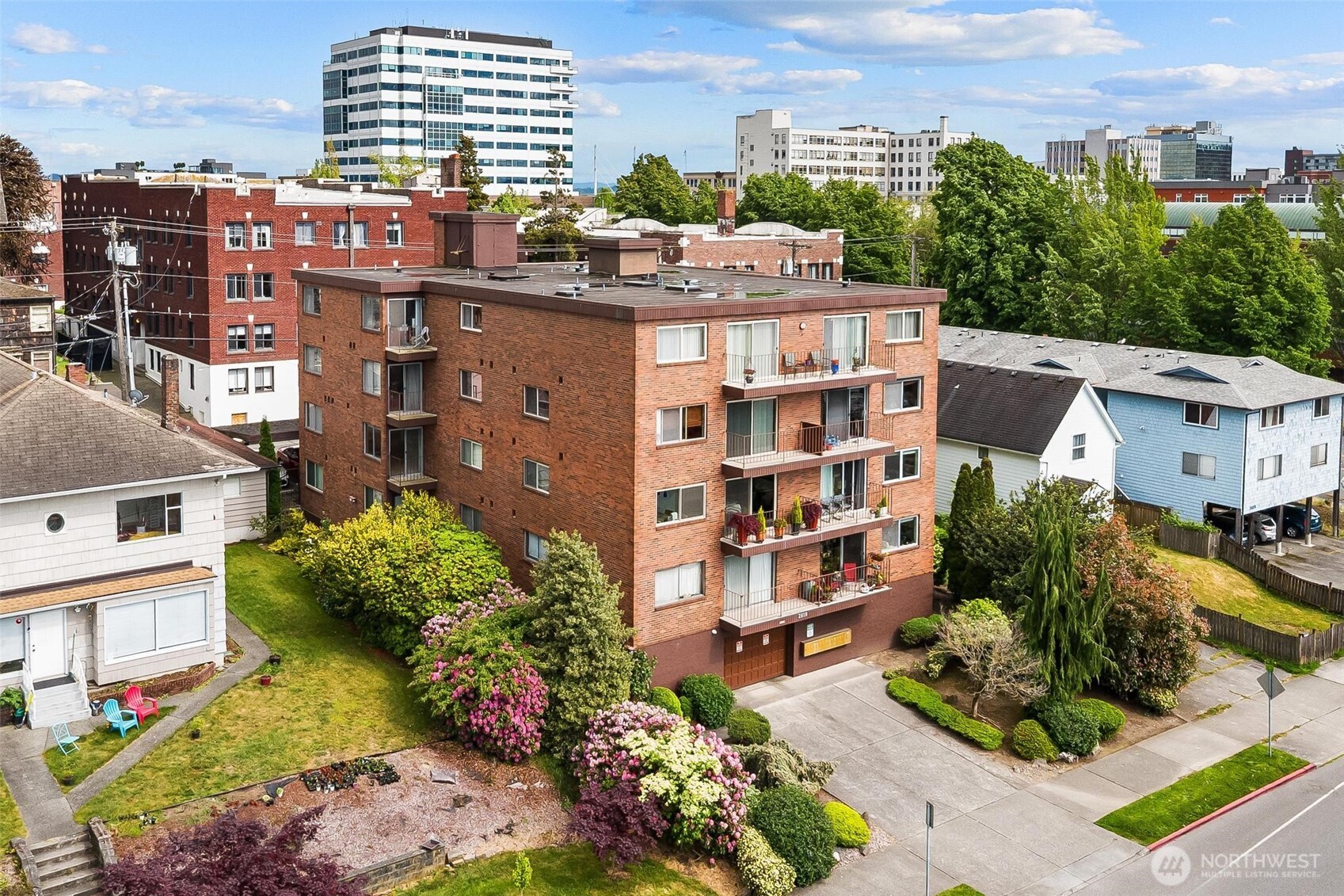 2619 Rucker Avenue, Unit 2 Everett, WA 98201 - Photo 2 of 33 a view of a city that has tall buildings