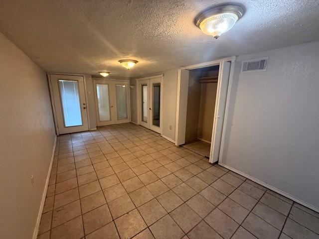 3105 Oak Rock Spring, TX 77373 - Photo 12 of 14 an empty room with windows