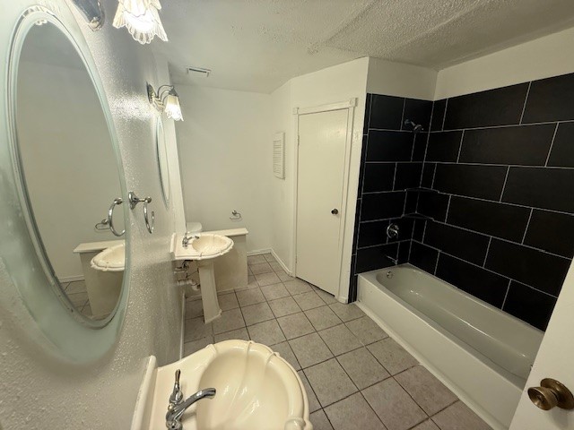 3105 Oak Rock Spring, TX 77373 - Photo 9 of 14 a bathroom with a sink a toilet and shower