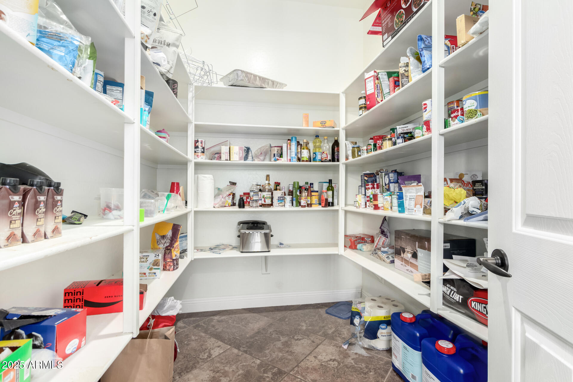 4935 West Yearling Road Phoenix, AZ 85083 - Photo 18 of 48 a room with storage and utility