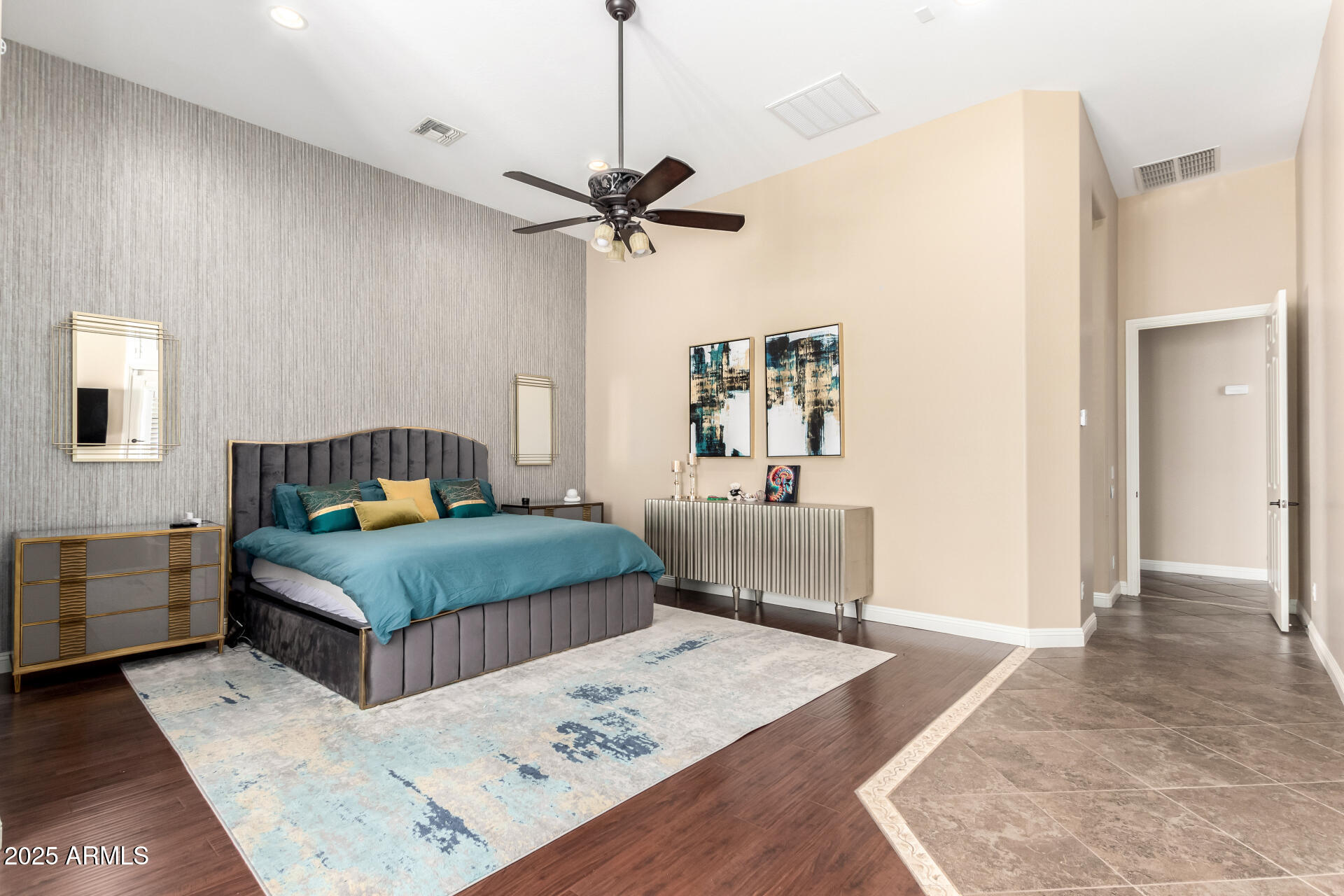 4935 West Yearling Road Phoenix, AZ 85083 - Photo 20 of 48 a bedroom with a bed and a table