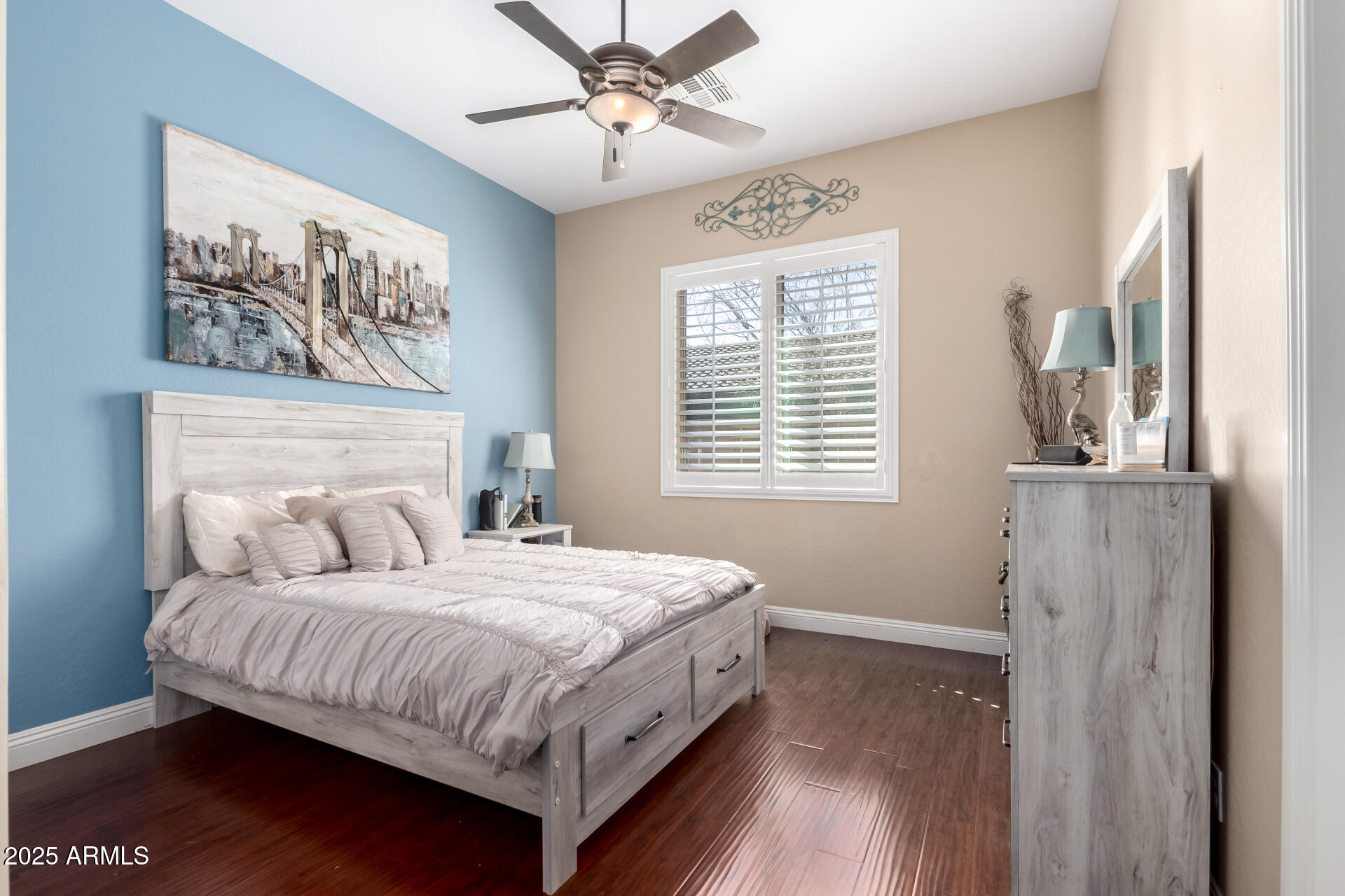 4935 West Yearling Road Phoenix, AZ 85083 - Photo 31 of 48 a bedroom with a bed and a window