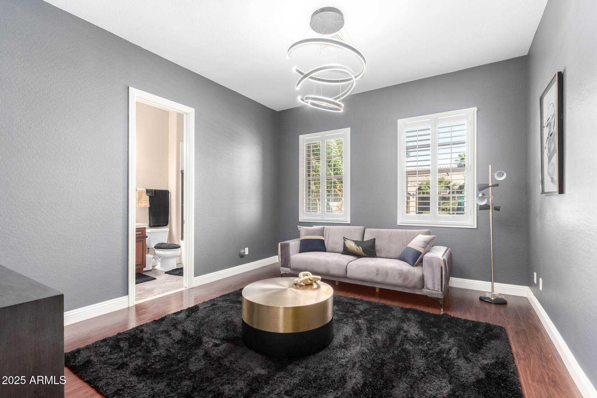 4935 West Yearling Road Phoenix, AZ 85083 - Photo 33 of 48 a living room with furniture and a large window