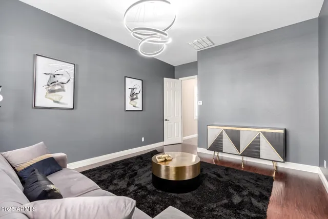 a utility room with granite countertop a sink and a washer dryer