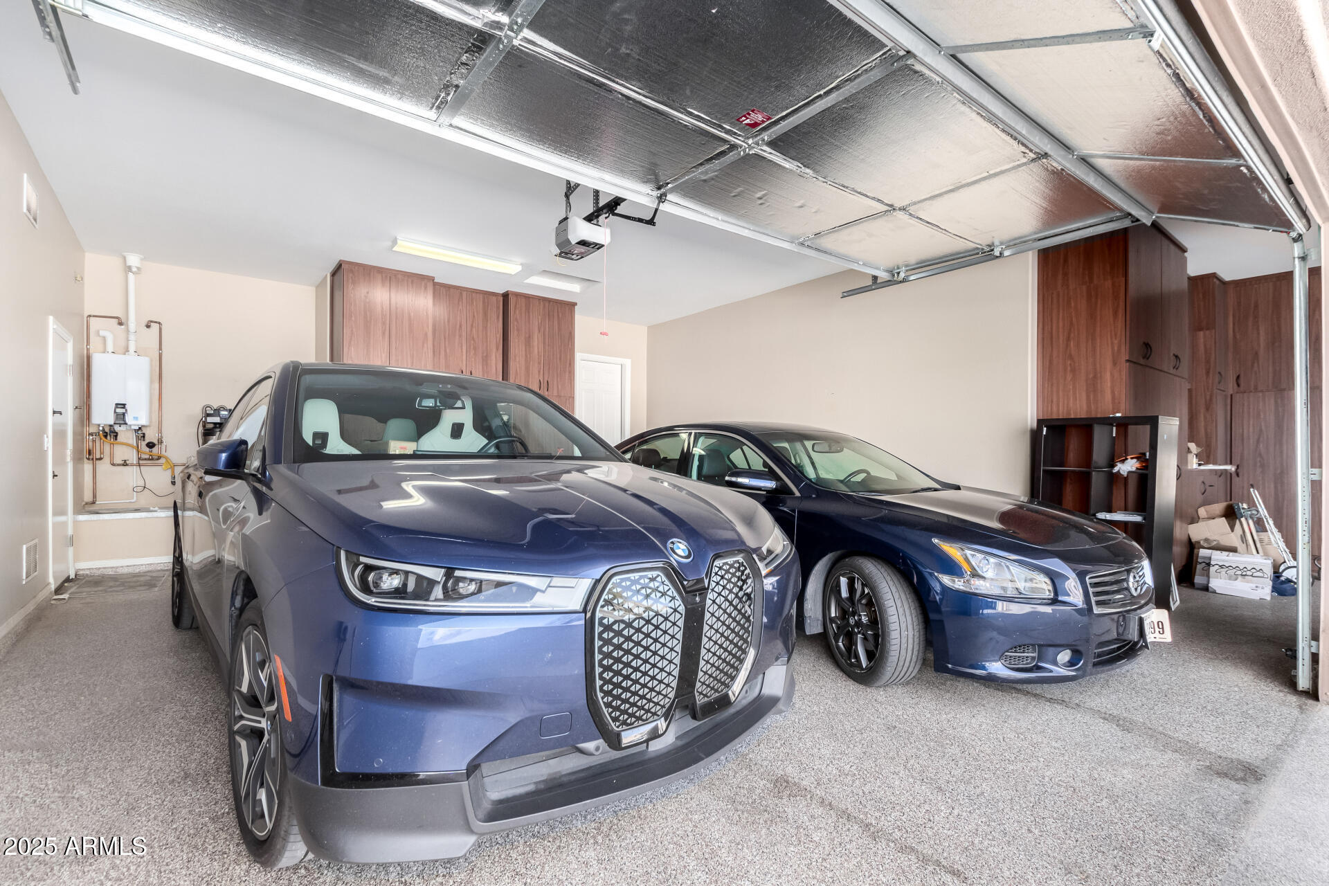 4935 West Yearling Road Phoenix, AZ 85083 - Photo 38 of 48 a car parked in a garage