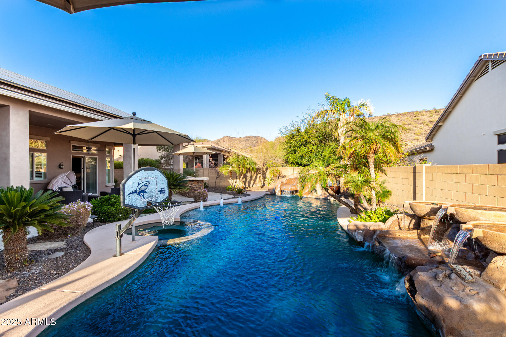4935 West Yearling Road Phoenix, AZ 85083 - Photo 46 of 48 a view of a porch with furniture and garden