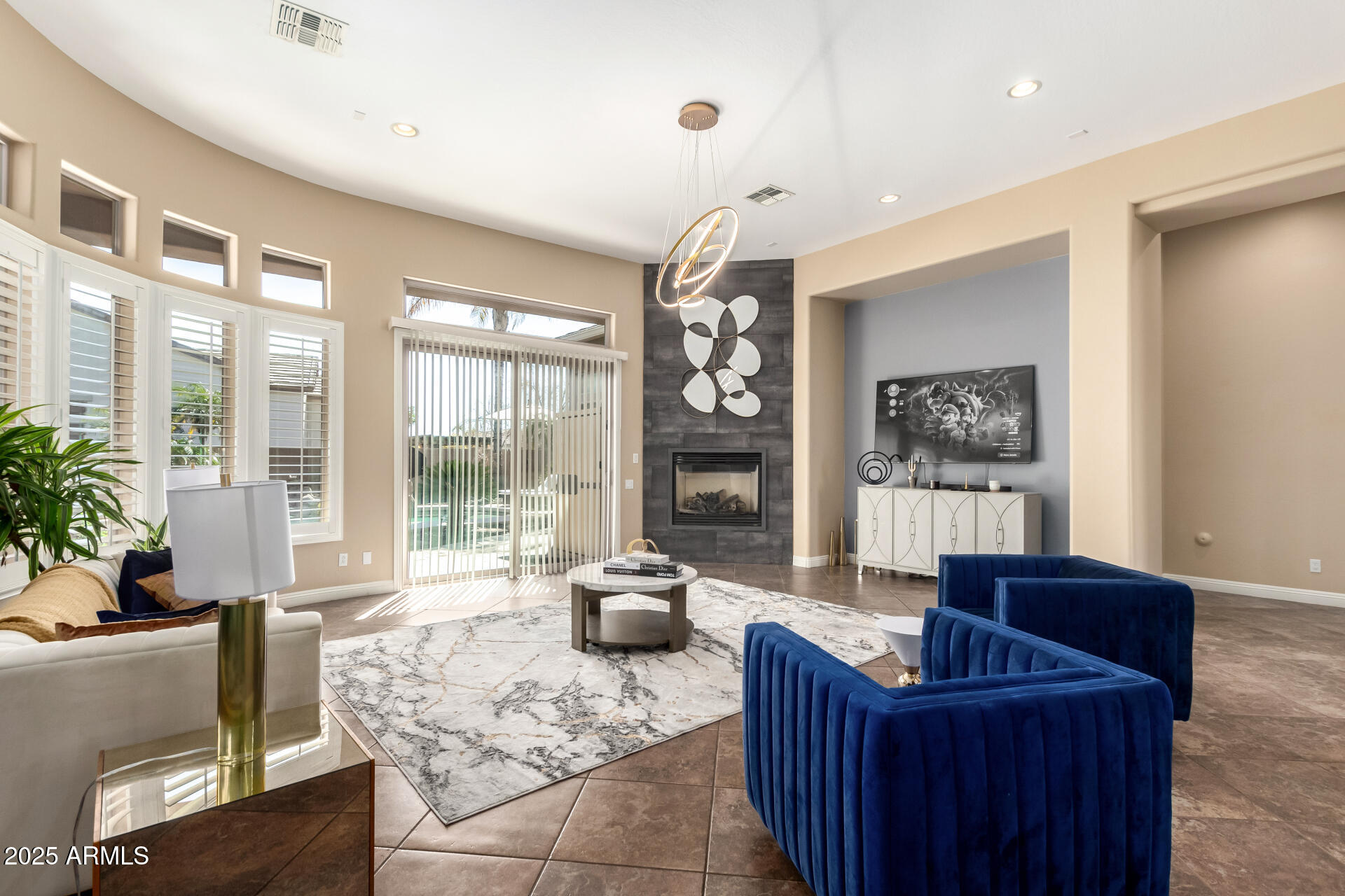 4935 West Yearling Road Phoenix, AZ 85083 - Photo 9 of 48 a living room with furniture and large windows