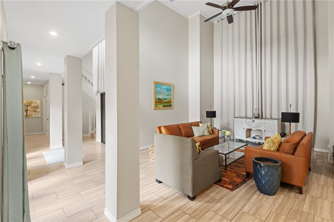 4658 Oso Parkway Corpus Christi, TX 78413 - Photo 6 of 33 a living room with furniture and a window