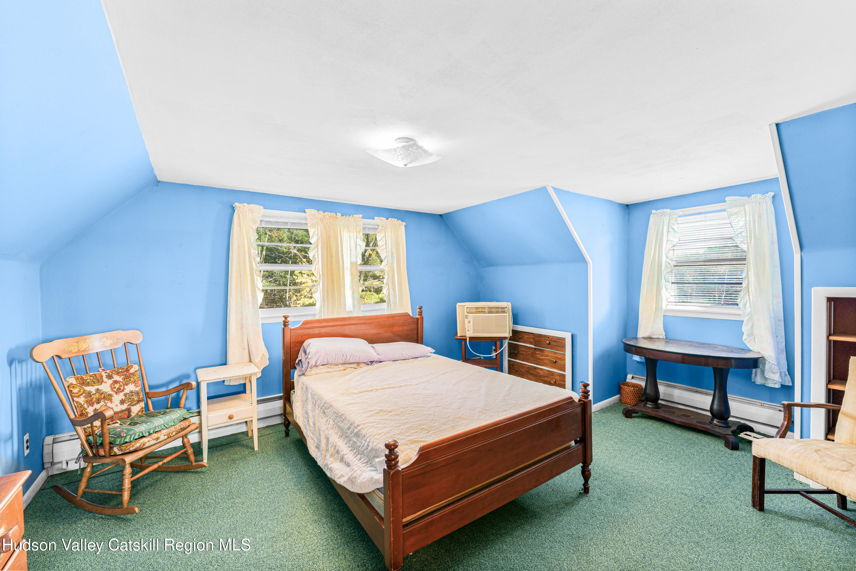 41 Fish Road Oak Hill, NY 12460 - Photo 12 of 37 a bedroom with a bed chair and window