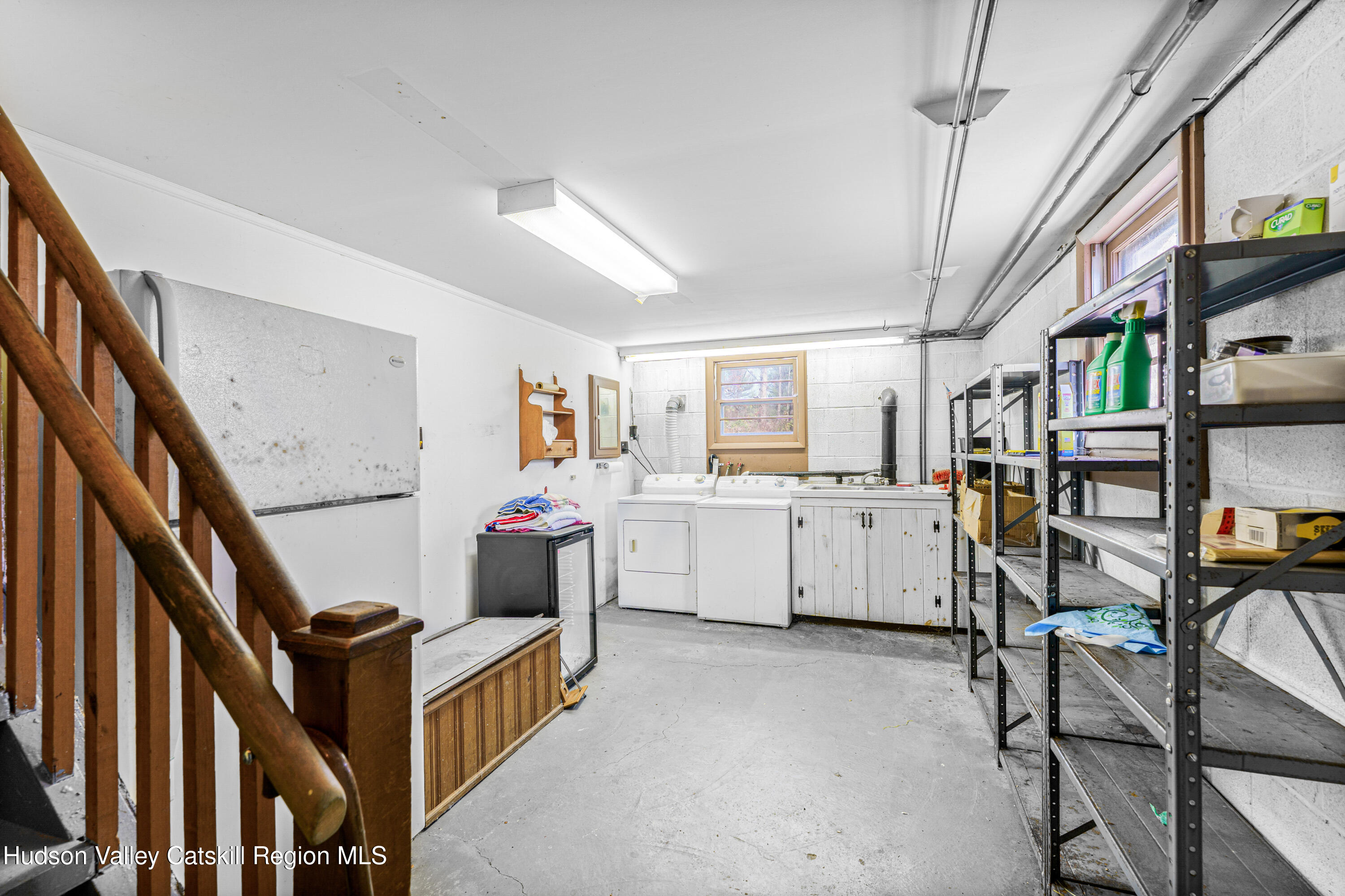 41 Fish Road Oak Hill, NY 12460 - Photo 16 of 37 a kitchen with furniture and white cabinets