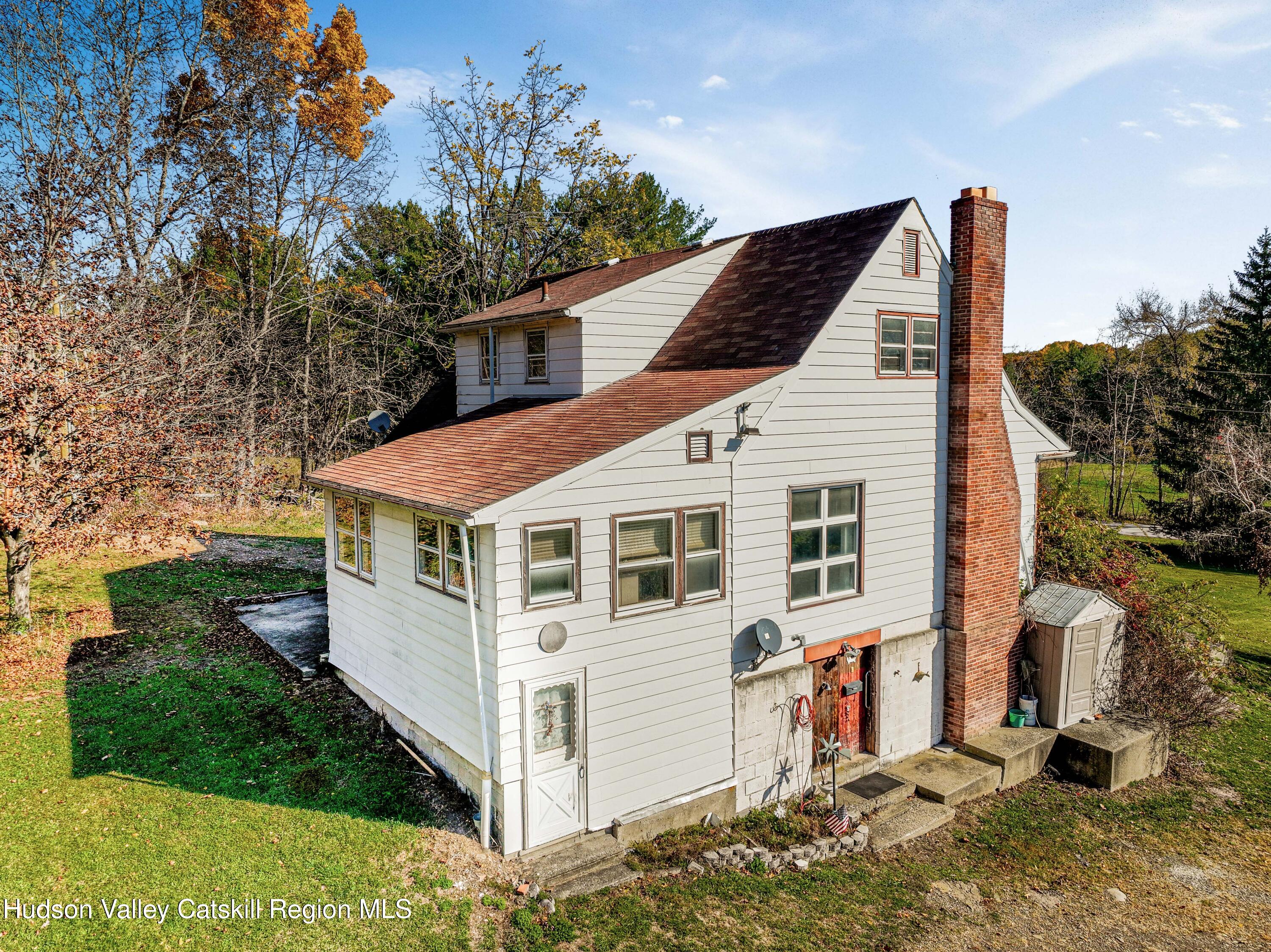 41 Fish Road Oak Hill, NY 12460 - Photo 26 of 37 a view of a house with a yard