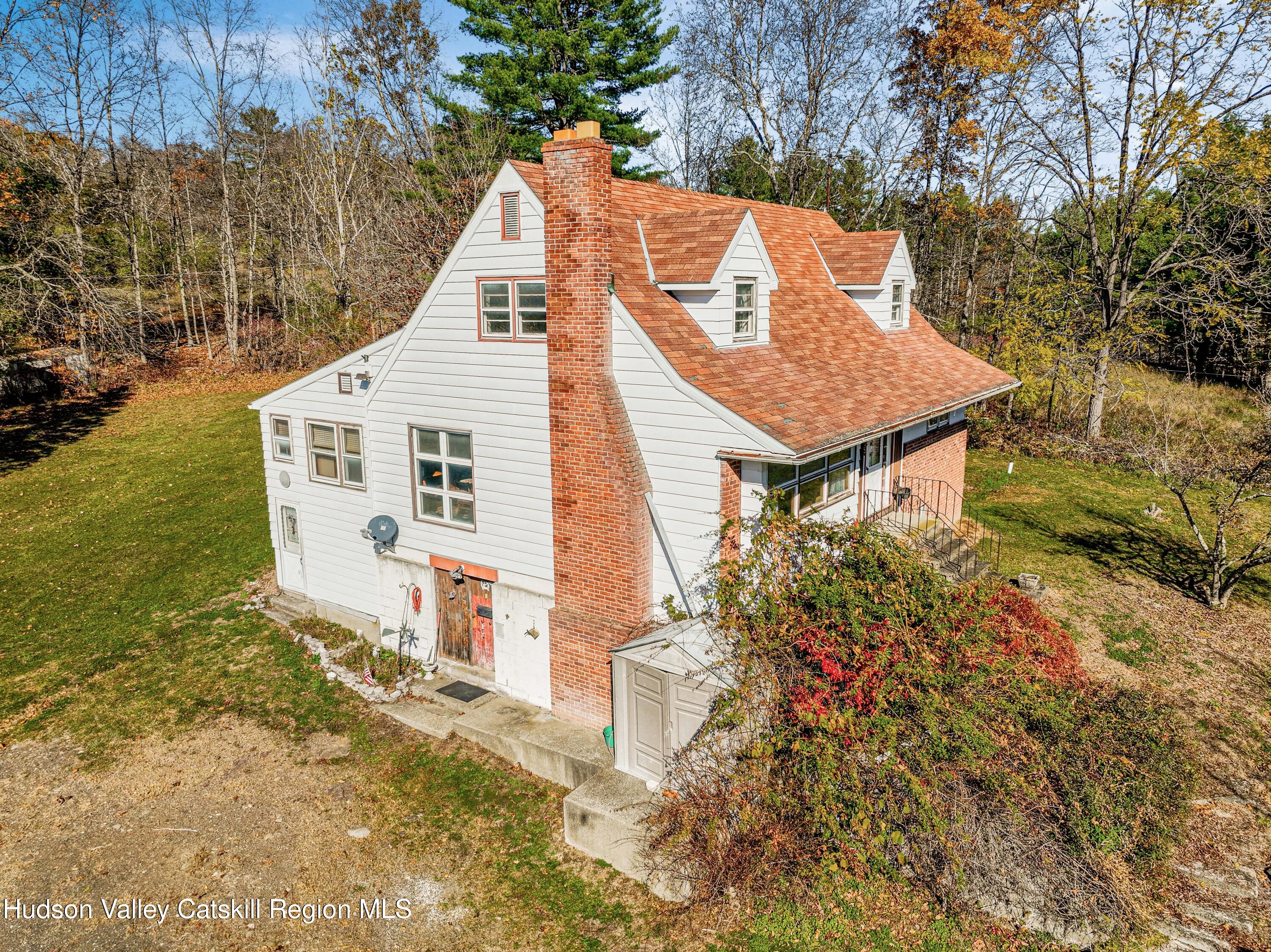 41 Fish Road Oak Hill, NY 12460 - Photo 27 of 37 a view of a house with a yard