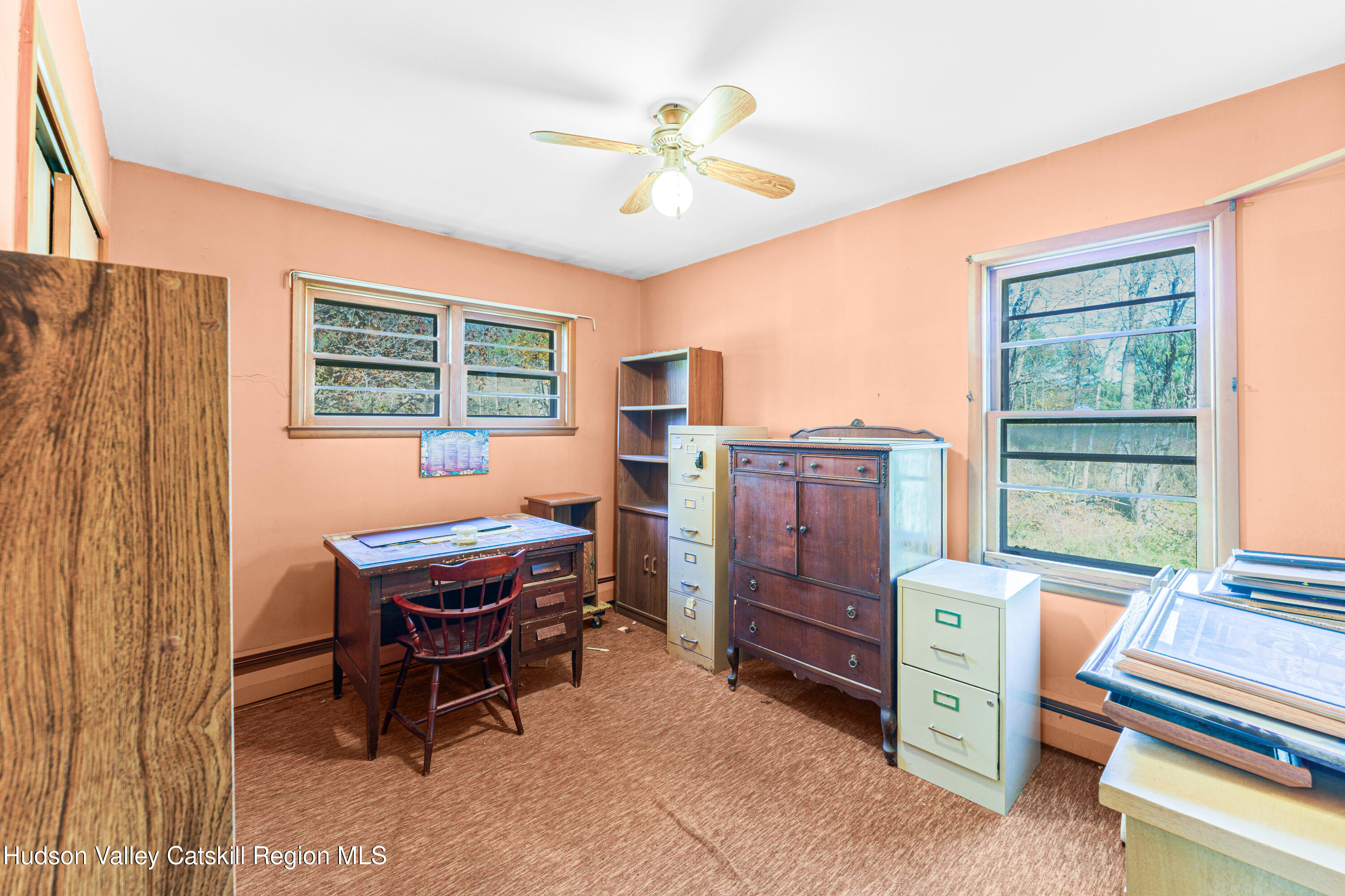 41 Fish Road Oak Hill, NY 12460 - Photo 8 of 37 a room with furniture a chandelier and a window