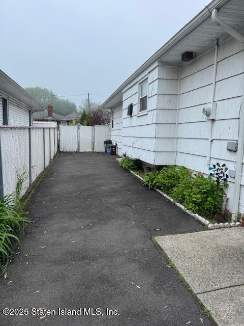 61 Morton Street Staten Island, NY 10306 - Photo 17 of 18 a view of a house with backyard